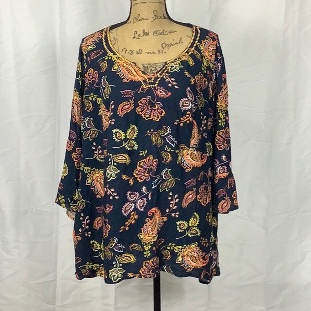 A colorful tunic blouse ready for summer evenings